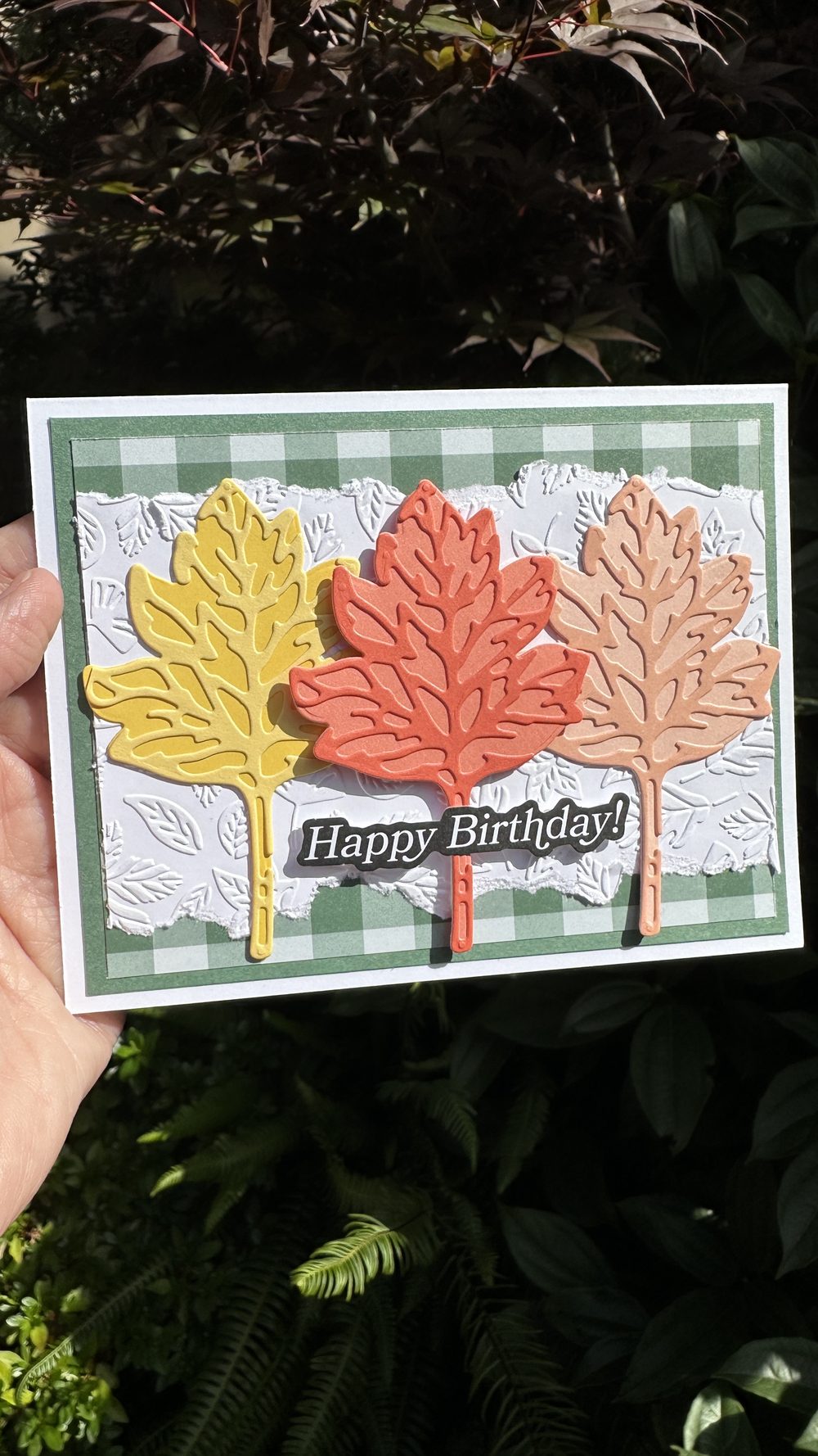 Handmade Happy Birthday card with yellow, coral and pink Elegant Leaves die cuts on green gingham