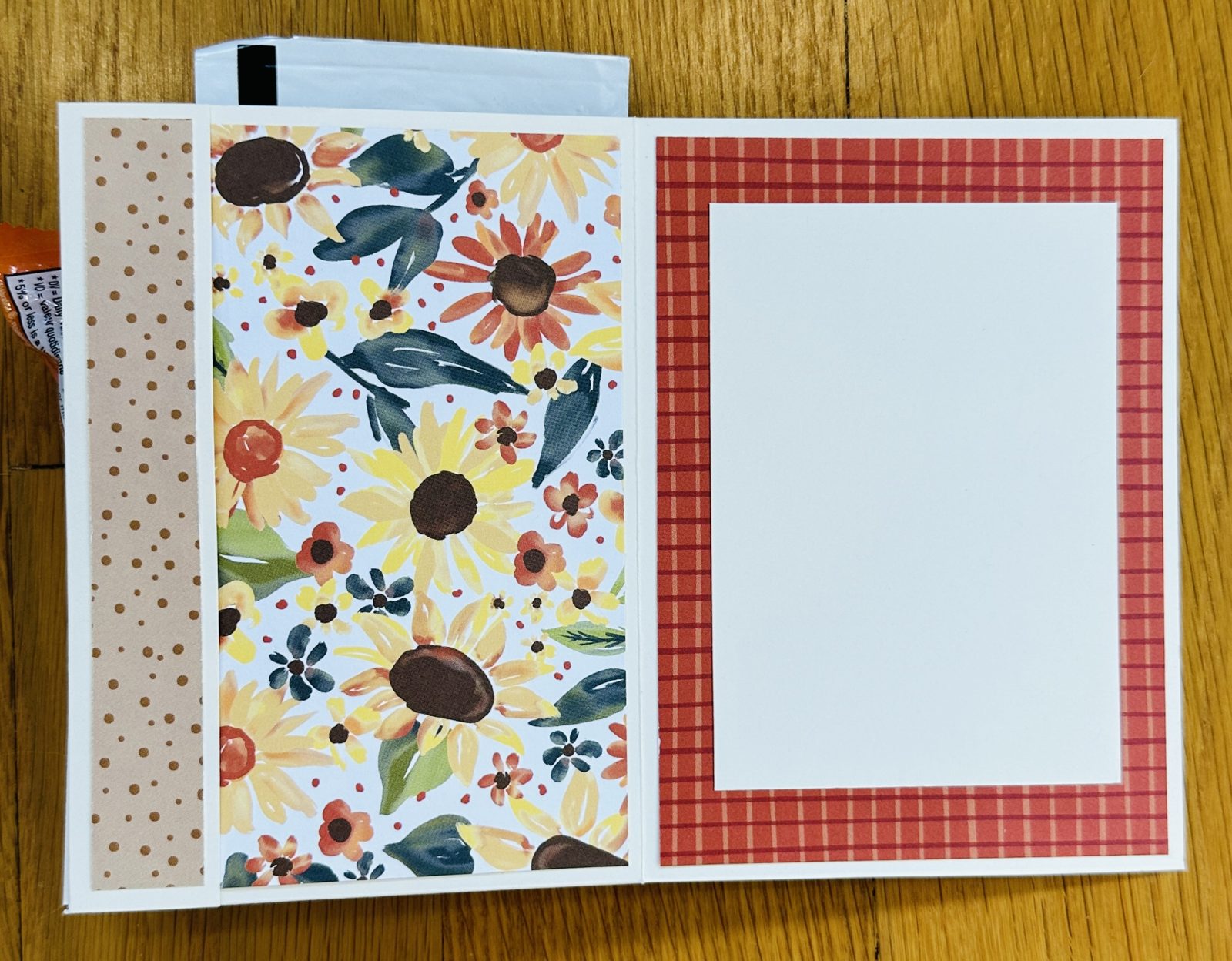 Inside of the fall sunflower treat holder card showing the gift card pocket and a plaid panel for a handwritten message